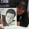 2013-02_DeanPosesWithPicture